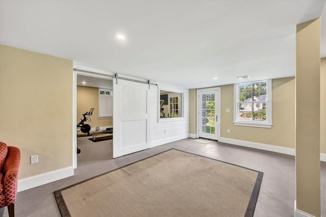 10 Herring Gull Rd, Mashpee, MA 02649 - workout room with a barn door and recessed lighting