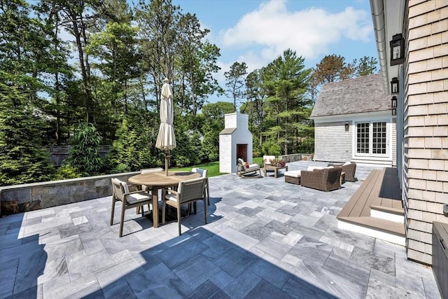 10 Herring Gull Rd, Mashpee, MA 02649 - view of patio featuring an outdoor living space with a fireplace and outdoor dining space