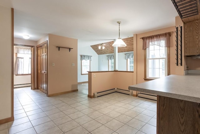 18 Oakwind Holw, Leominster, MA 01453 - kitchen with a baseboard heating unit, light tile patterned flooring, and baseboards