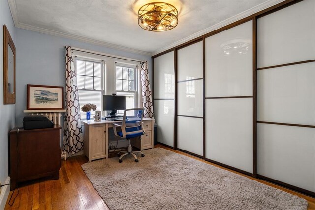 34 Sheafe St Unit 1, Brookline, MA 02467 - office area with wood-type flooring, crown molding, and a baseboard heating unit