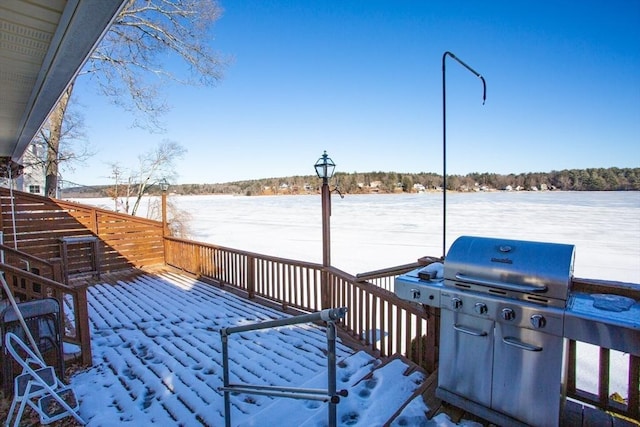 view of snow covered deck