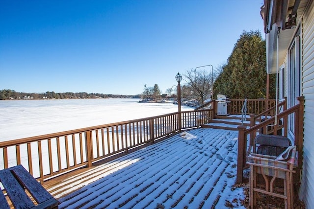 view of snow covered deck