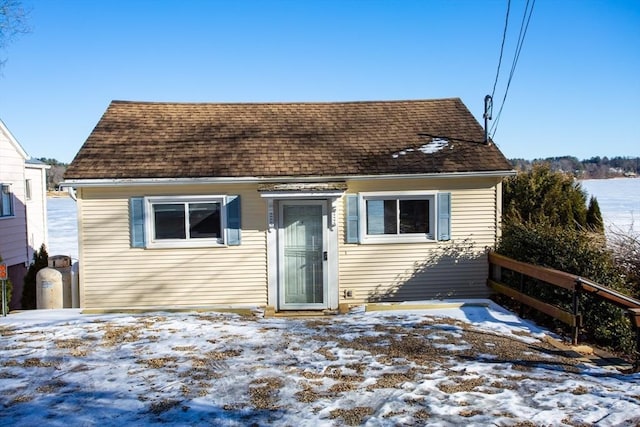 view of snow covered house