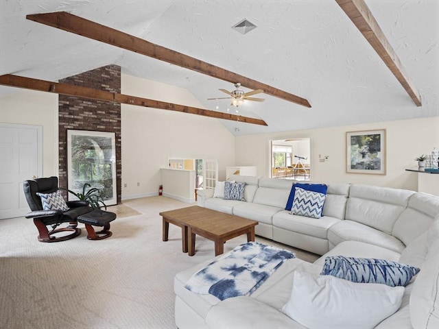 living room with light carpet, lofted ceiling with beams, visible vents, and a textured ceiling