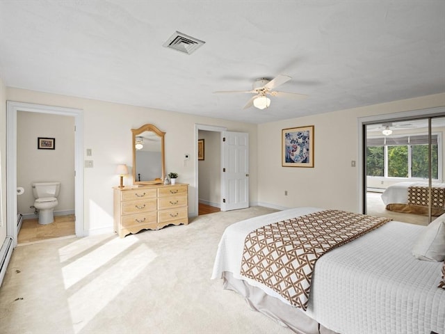 bedroom with light carpet, ensuite bath, visible vents, and baseboards