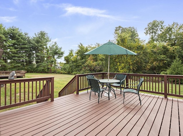 deck featuring a yard