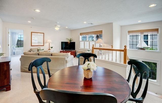 dining room with carpet, a ceiling fan, and recessed lighting