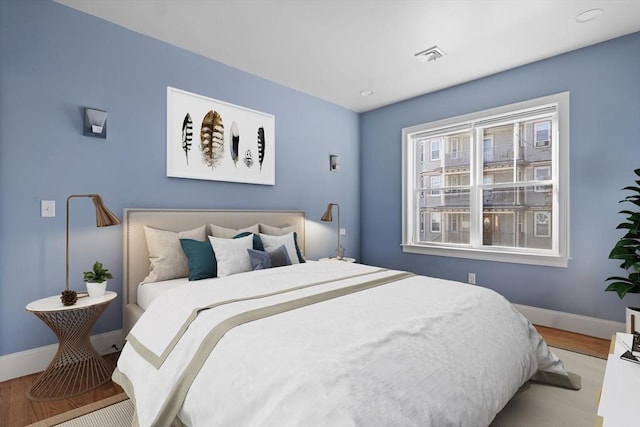 bedroom featuring light hardwood / wood-style flooring