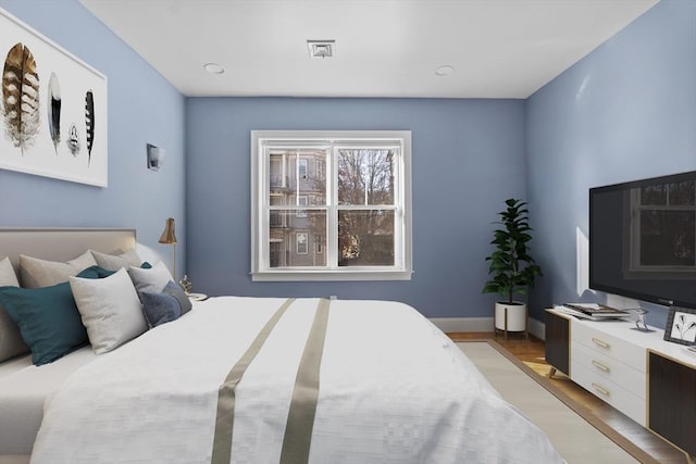 bedroom featuring light wood-type flooring