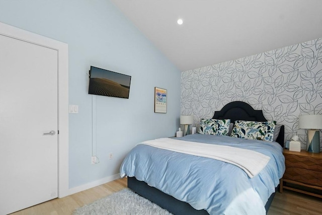 21 Milton Rd, Quincy, MA 02171 - bedroom with lofted ceiling, wood finished floors, baseboards, and recessed lighting
