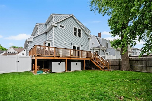 21 Milton Rd, Quincy, MA 02171 - rear view of house with a deck, a gate, stairway, and a garage