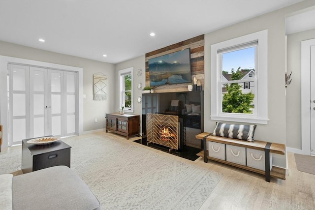 21 Milton Rd, Quincy, MA 02171 - living room with baseboards, recessed lighting, wood finished floors, and a large fireplace