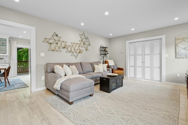 21 Milton Rd, Quincy, MA 02171 - living area with light wood finished floors, recessed lighting, and baseboards