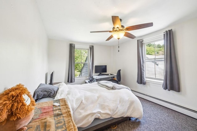 197-199 Main St, Chelmsford, MA 01863 - bedroom with baseboard heating, carpet flooring, a ceiling fan, and a desk