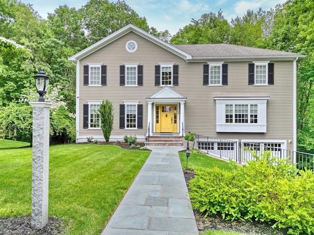 24 Cory Ln, Reading, MA 01867 - colonial home with a front lawn