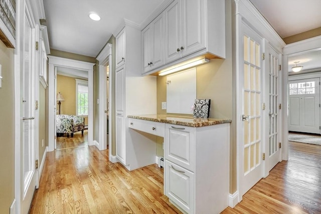 24 Cory Ln, Reading, MA 01867 - hall featuring light wood finished floors, an office area, french doors, baseboards, and recessed lighting