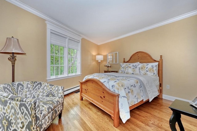 24 Cory Ln, Reading, MA 01867 - bedroom featuring crown molding, wood finished floors, baseboard heating, and baseboards