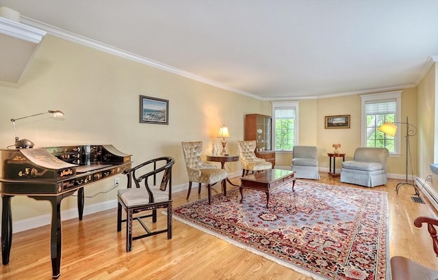 24 Cory Ln, Reading, MA 01867 - living area featuring wood finished floors, crown molding, and baseboards