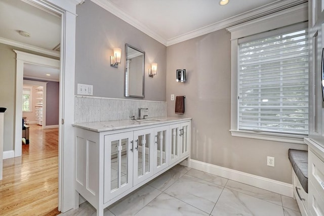 24 Cory Ln, Reading, MA 01867 - bathroom with vanity, crown molding, baseboards, recessed lighting, and marble finish flooring