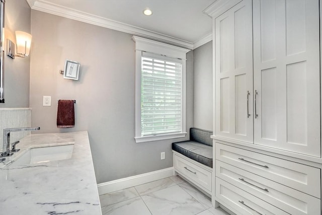 24 Cory Ln, Reading, MA 01867 - bathroom with ornamental molding, marble look tiles, vanity, baseboards, and recessed lighting