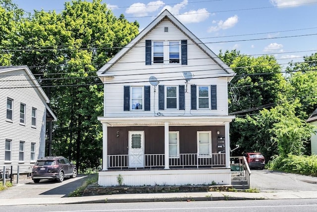 1130 Water St, Fitchburg, MA 01420 - view of front facade featuring covered porch
