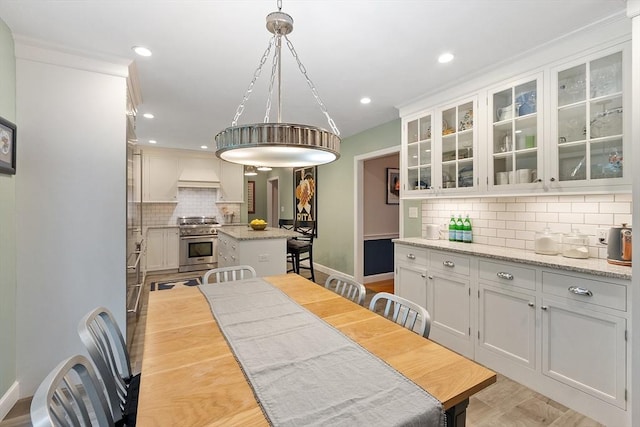 15 Saxon Ln, Shrewsbury, MA 01545 - dining room featuring baseboards and recessed lighting