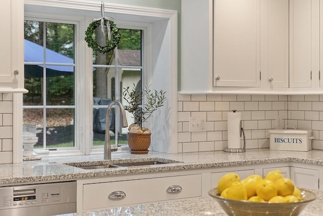 15 Saxon Ln, Shrewsbury, MA 01545 - kitchen with dishwasher, white cabinets, and decorative backsplash