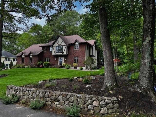 15 Saxon Ln, Shrewsbury, MA 01545 - tudor home featuring a front lawn