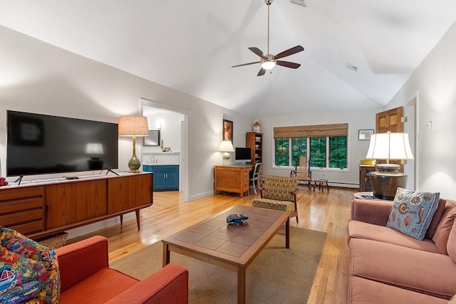 15 Saxon Ln, Shrewsbury, MA 01545 - living room featuring light wood-type flooring, lofted ceiling, and ceiling fan