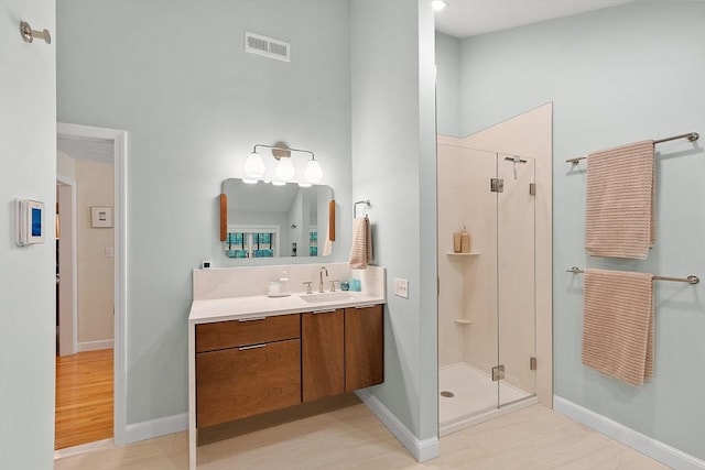 15 Saxon Ln, Shrewsbury, MA 01545 - full bathroom featuring a shower stall, vanity, and a towering ceiling