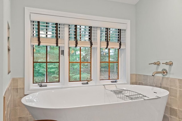 15 Saxon Ln, Shrewsbury, MA 01545 - full bathroom with tile walls, a freestanding bath, healthy amount of natural light, and a wainscoted wall