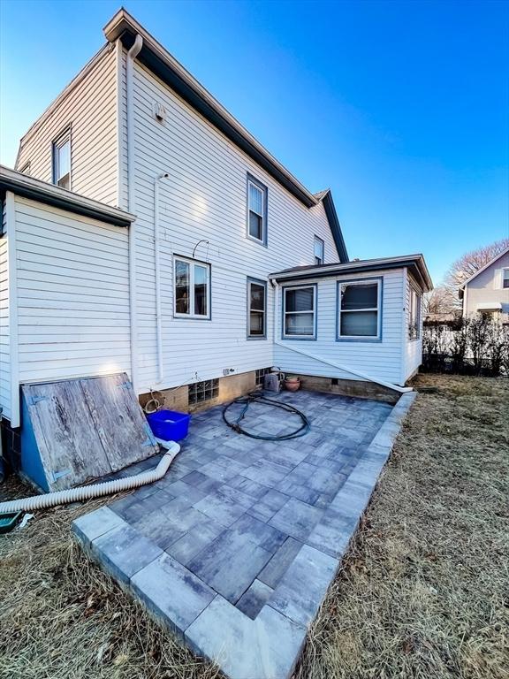 rear view of property with a patio area