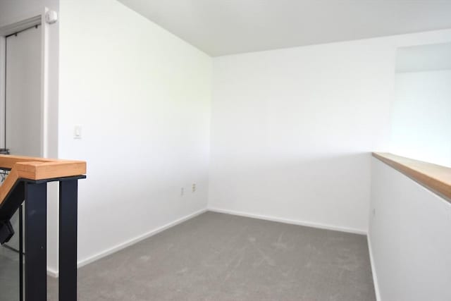 1 Earhart St Unit 320, Cambridge, MA 02141 - carpeted empty room featuring baseboards