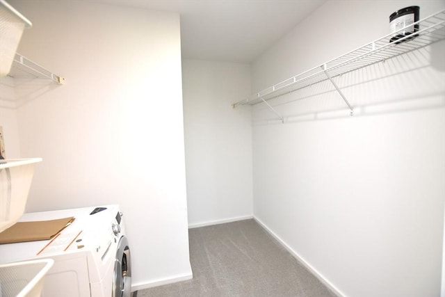 1 Earhart St Unit 320, Cambridge, MA 02141 - walk in closet featuring washing machine and dryer and carpet flooring