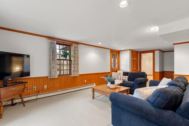 living area with a baseboard heating unit, carpet flooring, recessed lighting, and wainscoting