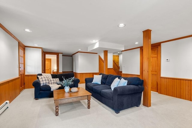 living room with carpet flooring, recessed lighting, a wainscoted wall, and wood walls