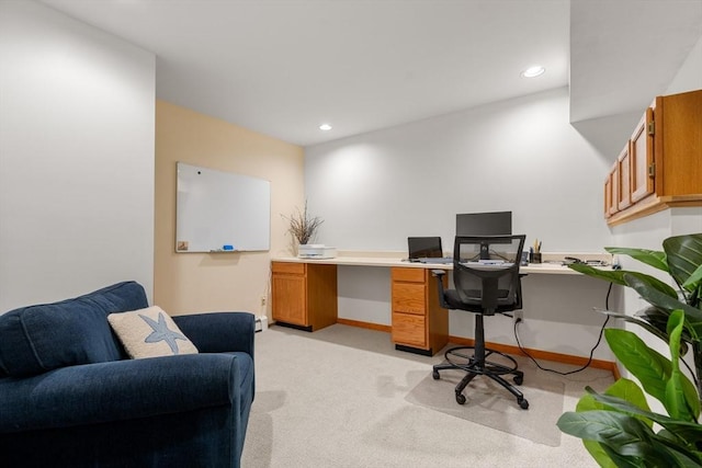 office area with recessed lighting, baseboards, and light carpet