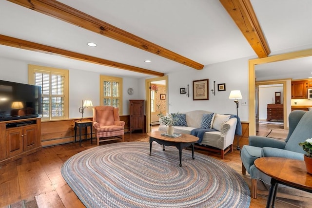 living room with recessed lighting, a baseboard radiator, beam ceiling, and light wood-style floors