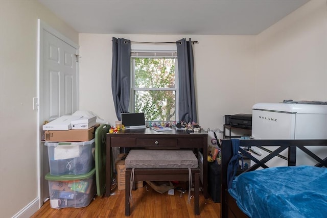 70 Puritan Rd, Bourne, MA 02532 - bedroom with wood finished floors, an office area, and baseboards