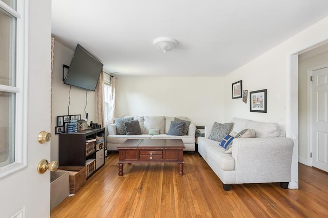 70 Puritan Rd, Bourne, MA 02532 - living room featuring wood finished floors