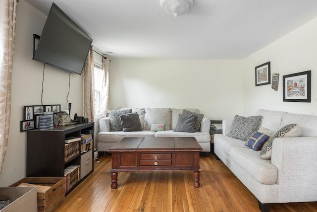 70 Puritan Rd, Bourne, MA 02532 - living room featuring dark wood-type flooring