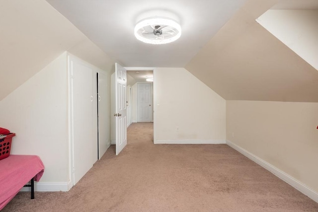 70 Puritan Rd, Bourne, MA 02532 - bonus room with light colored carpet, vaulted ceiling, baseboards, and ceiling fan