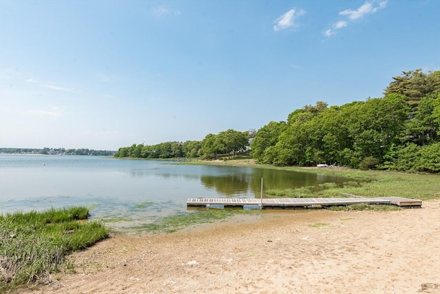 70 Puritan Rd, Bourne, MA 02532 - water view featuring a floating dock and a forest