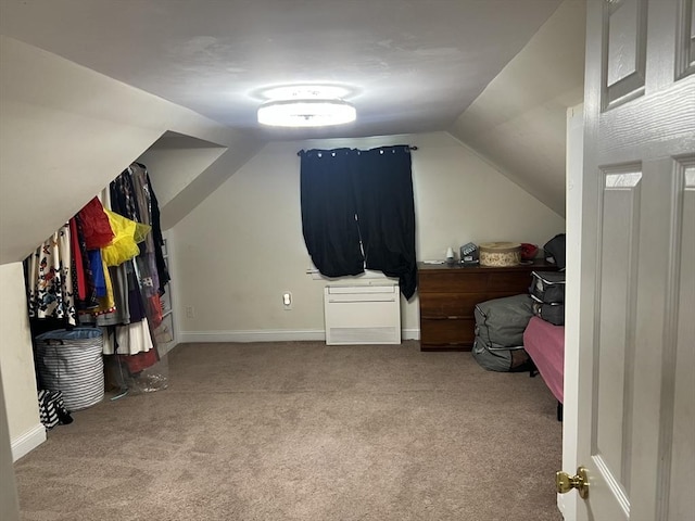 70 Puritan Rd, Bourne, MA 02532 - additional living space with carpet, vaulted ceiling, and baseboards