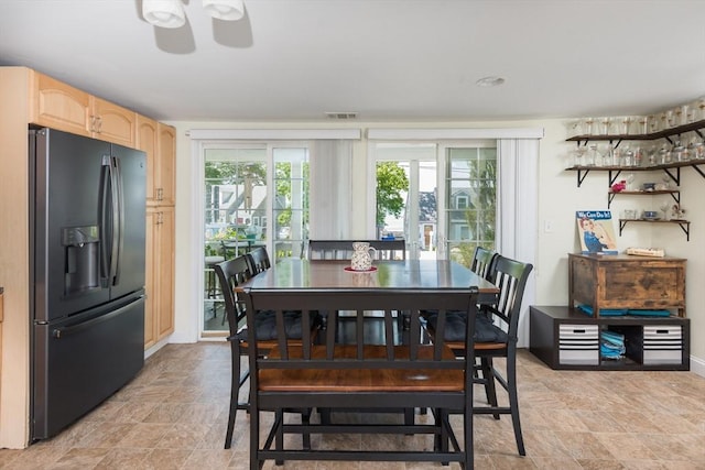 70 Puritan Rd, Bourne, MA 02532 - dining space featuring healthy amount of natural light, ceiling fan, and stone finish floors
