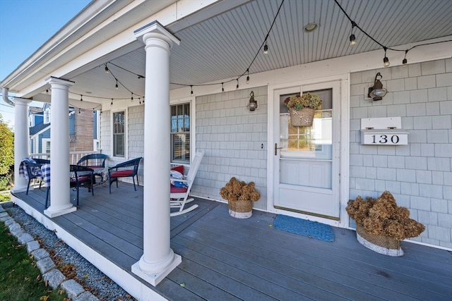 deck with covered porch