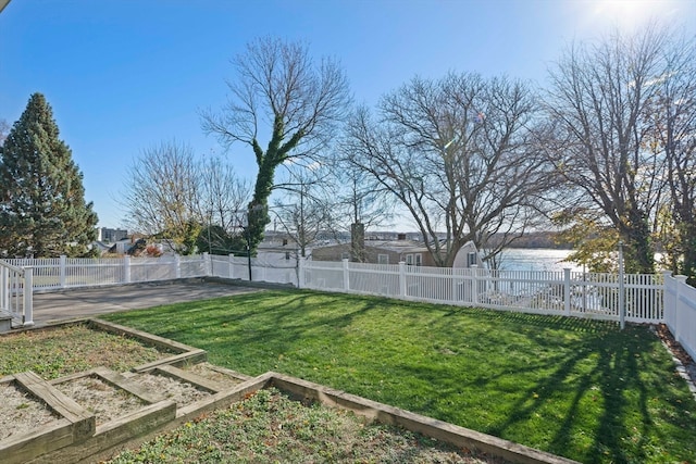 view of yard with a water view