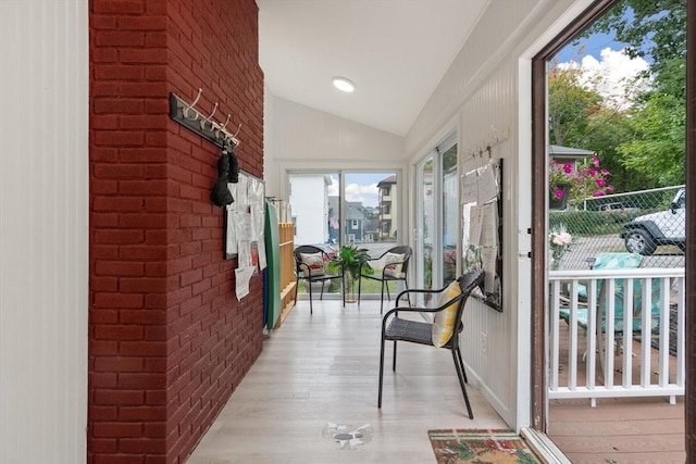 interior space featuring vaulted ceiling