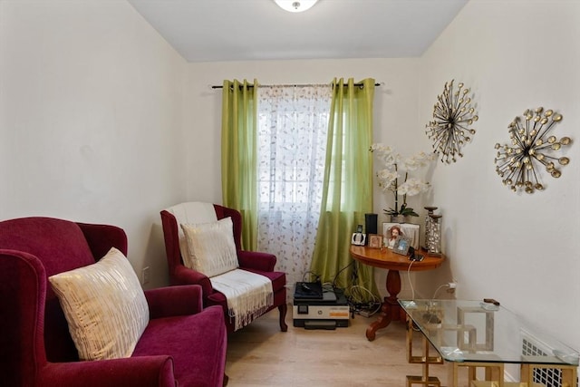 living area featuring hardwood / wood-style flooring