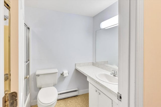 bathroom with a baseboard radiator, toilet, a wall mounted AC, vanity, and an enclosed shower